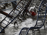 An image showing a roller-coaster ride swept into the sea by Super Storm Sandy